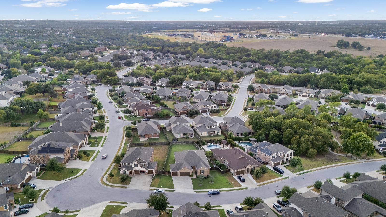 Established tree-lined street of larger homes in the Behrens Ranch neighborhood