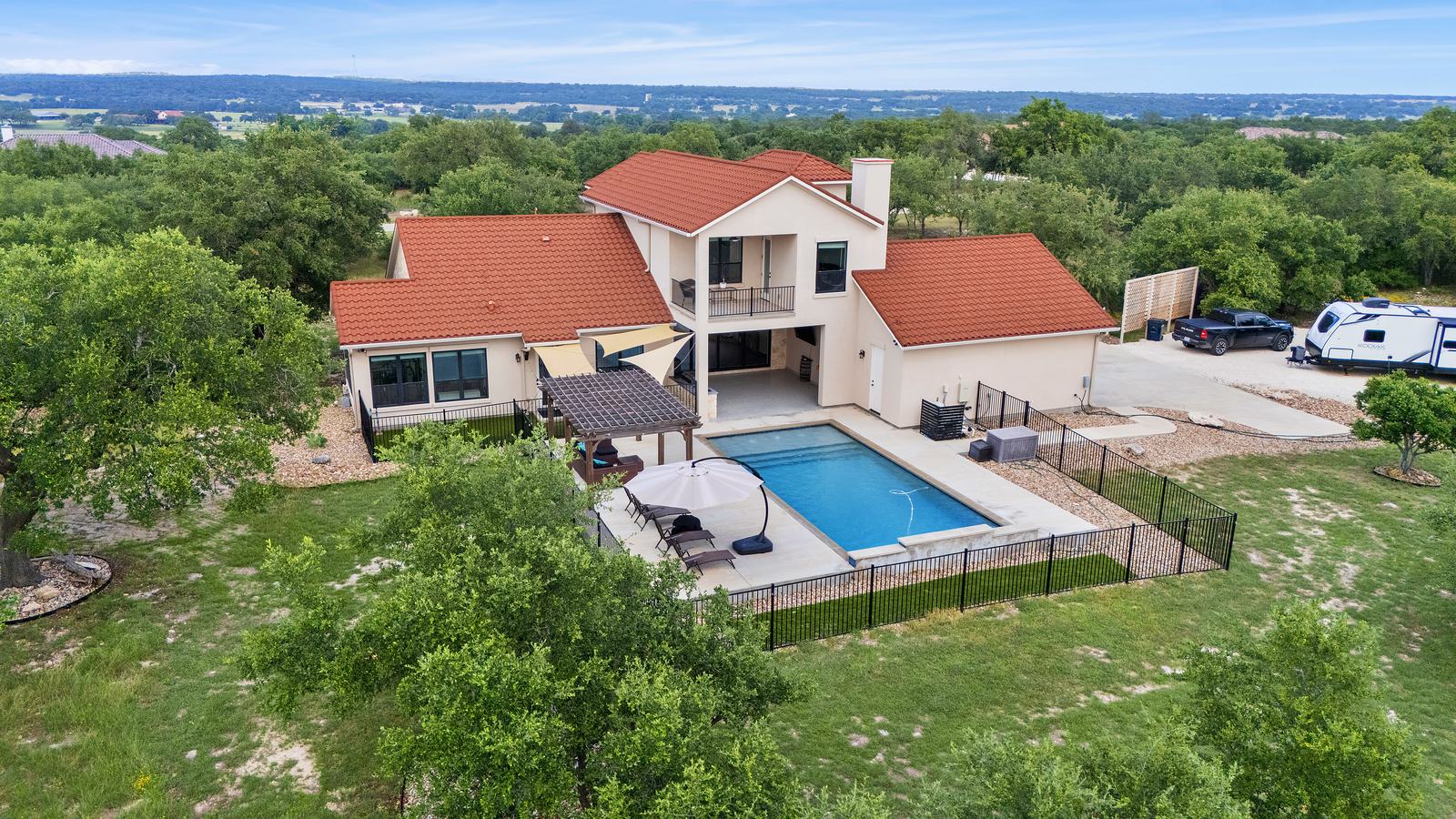 Front-porch homes and sidewalk-lined streetscape in the Bryson community in Leander