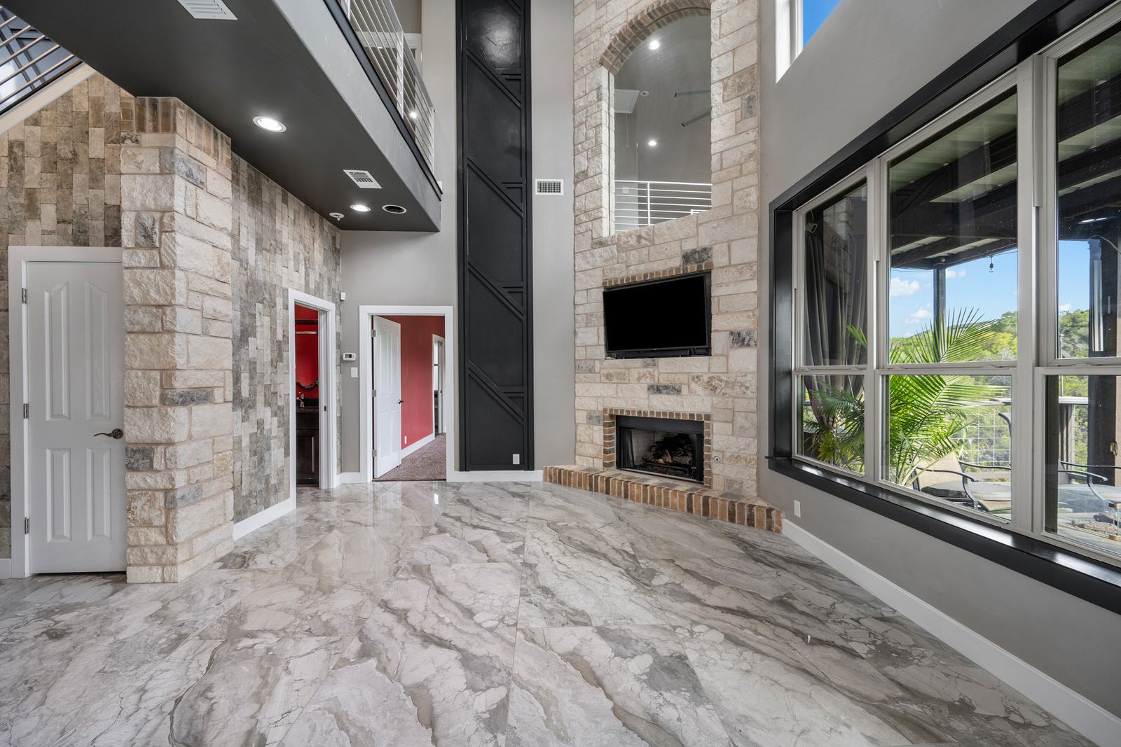 Bright Central Texas living room photographed with balanced window and interior exposure